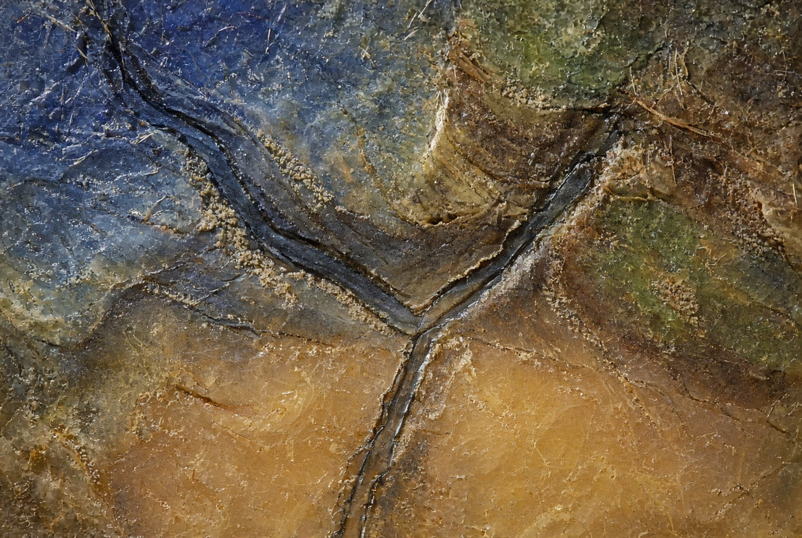 Three graphite tributaries meeting at a confluence